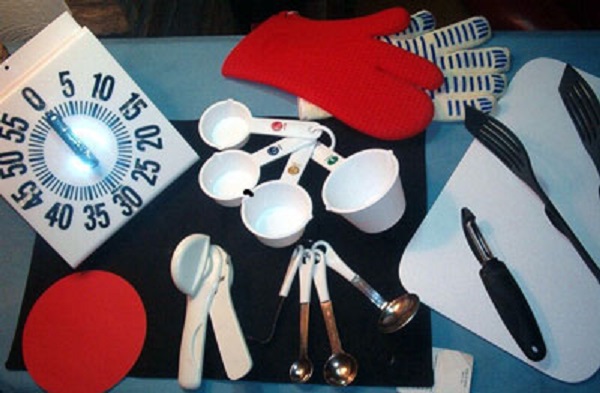 accessible cooking utensils including kitchen timer, measuring cups and spoons, etc.