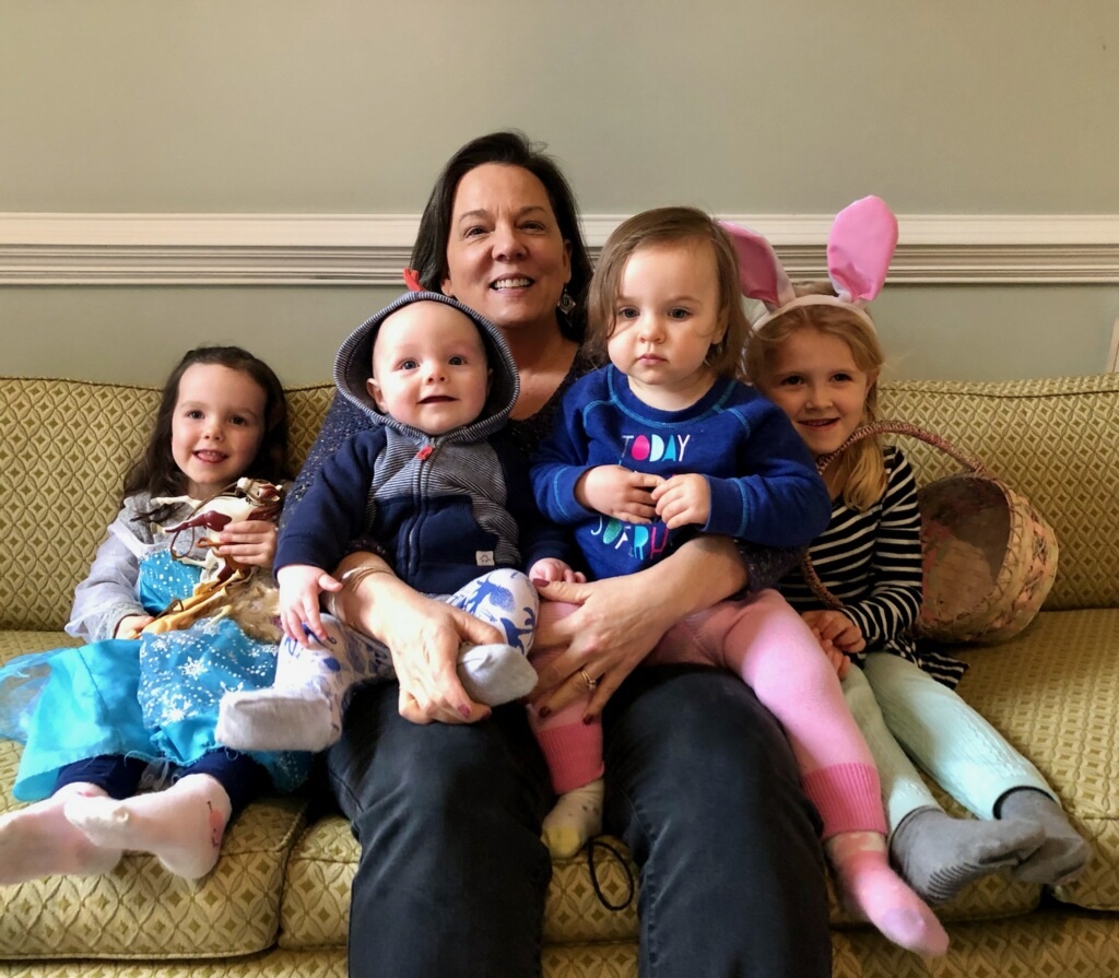 audrey with grandchildren on lap and around her