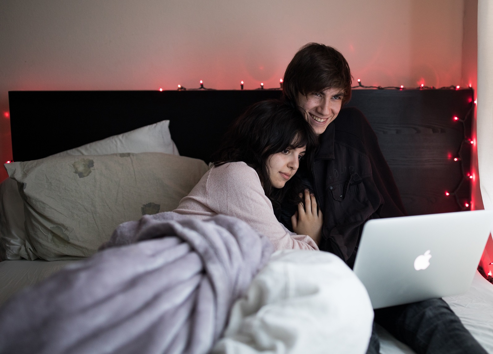 couple sitting on sofa watching apple tv 
Photo by Thought Catalog on Unsplash