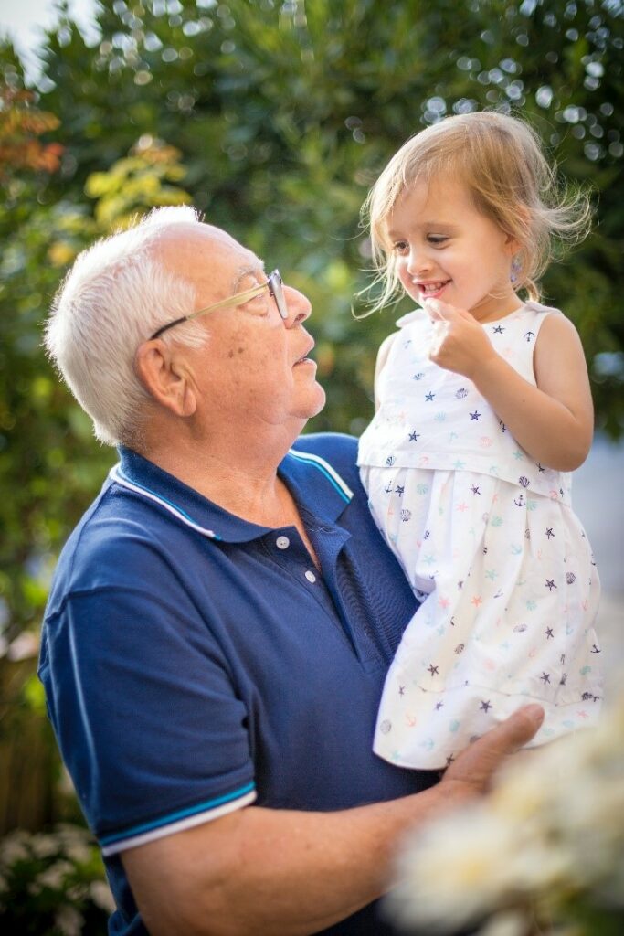 grandfather holding small child
Photo by Isaac Quesada on Unsplash 