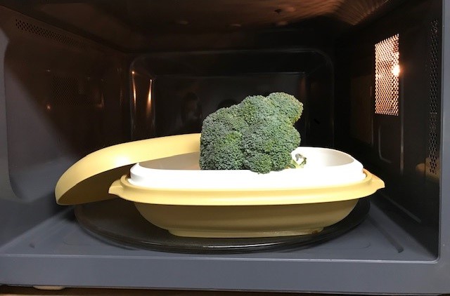 
microwave steamer with broccoli inside