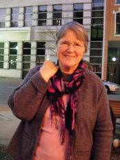 Lynley--standing on street wearing coat and scarf