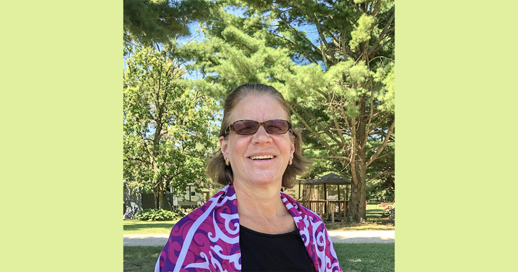 Elizabeth Smiling, Standing in Park