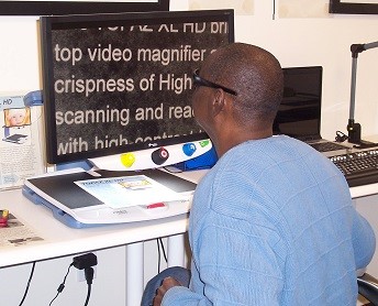 Man Using CCTV to Read 