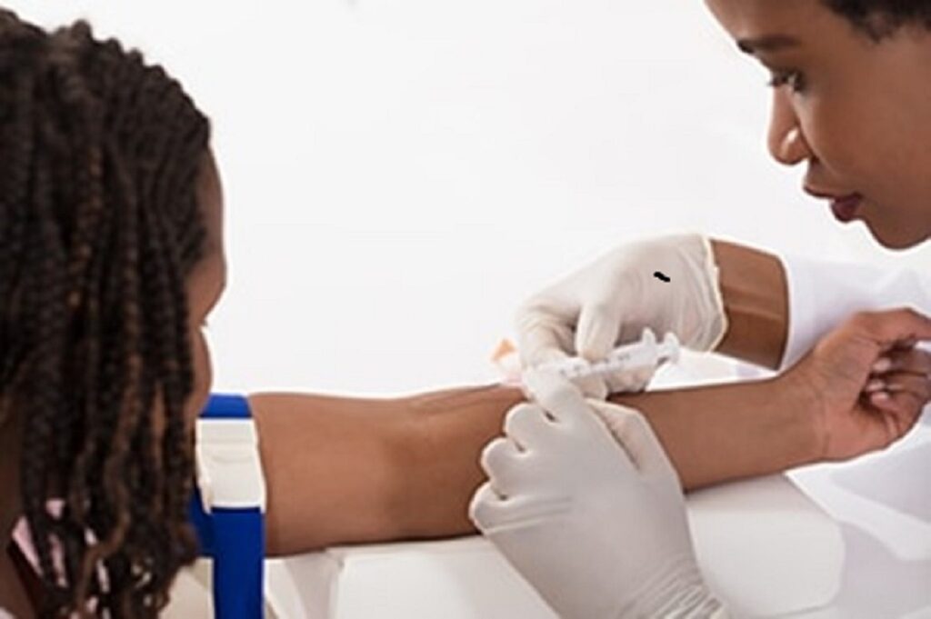 Person Taking Blood from Personfor A1c Test